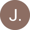 Brown circle with the letter 'J'.